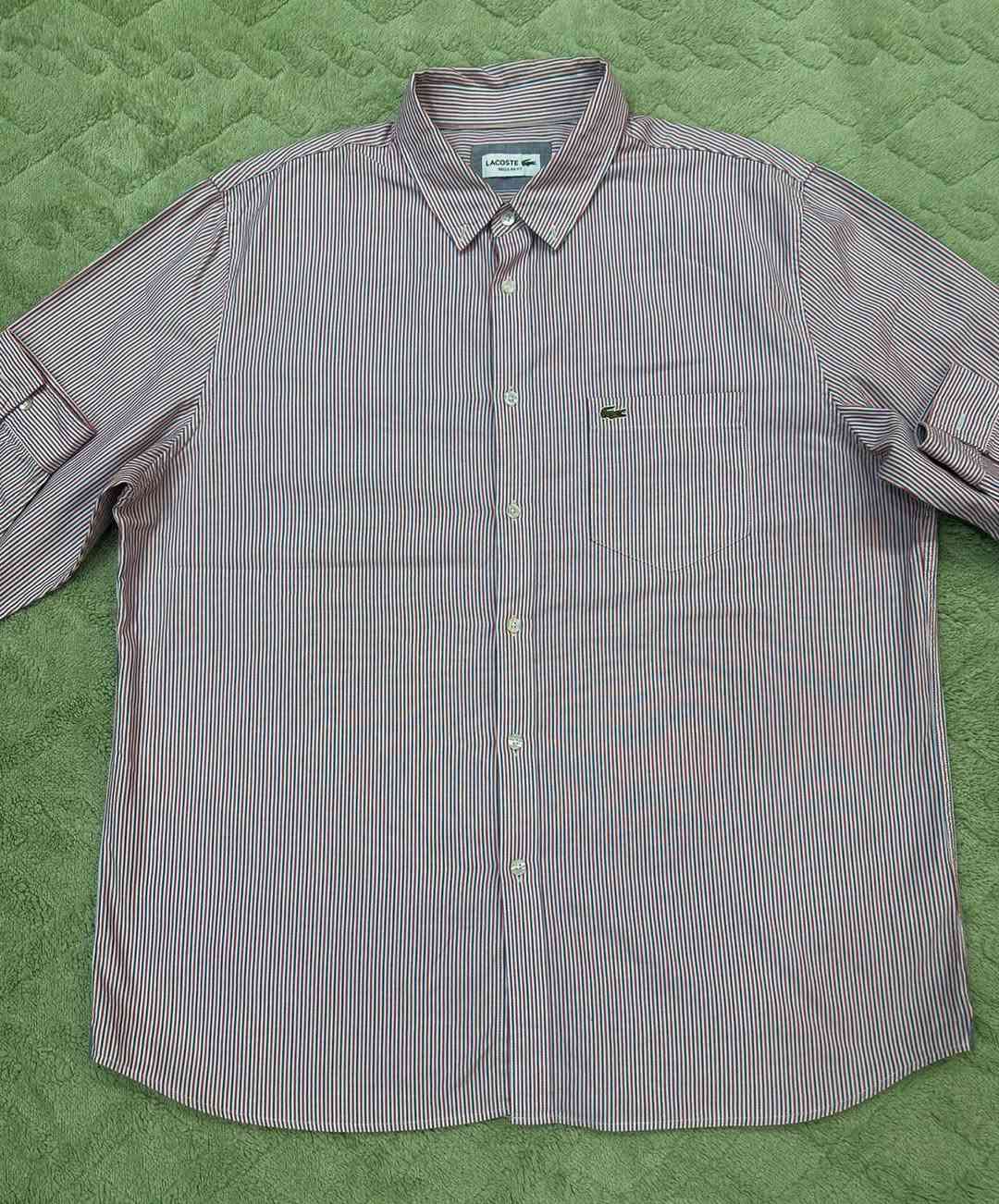 قميص لاكوست اصلي 
قياس xxl
طول القميص 79سم
عرض القميص 64سم 
السعر 20


**إذا كنت صاحب هذا الإعلان وتريد حذفه لأي سبب، رجاءا أرسل رسالة إلى الدعم الفني**