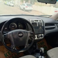 سبورتج موديل ٢٠٠٧ مصبوغه عام  السيارة كير ومحرك حلوات  تخم تاير جواها ...