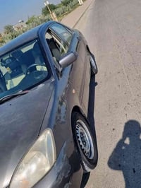 لانسر ٢٠١٠ مصبوغة عام كير و محرك و تبريد خير من الله سنوية باسمي بيع ا...