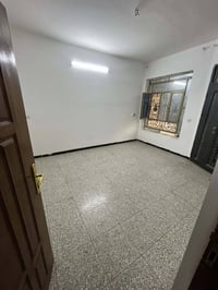 المنصور حي العربي دار للإيجار مساحة ١٠٠ متر   (كراج سيارة - صالة - مطب...