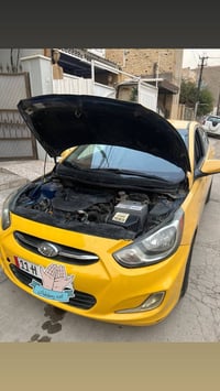 اكسنت ٢٠١٥ • اصفر • رقم بغداد