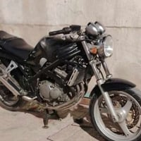 دراجة بطح باندة ربع محرك وكير مكفولات بس ردلة عقل فقط بيع كوم حديد 078...