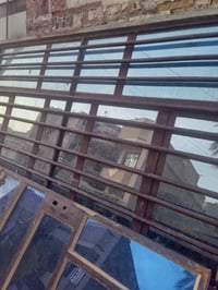 شبابيك  وابواب مال طابق  كامل مع الجام جديد للبيع بغداد شارع فلسطين ٠٧...