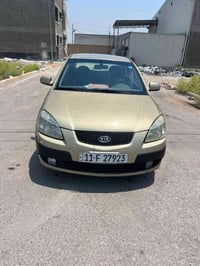 كيا ريو موديل 2007 امريكي , مصبوغة حزام وحالة الكشر موضحة بالصور كير و...