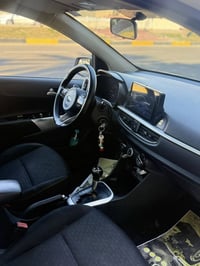 كيا بيكانتو 2019 خليجي اللون الأبيض /رقم بغداد /محرك 1200  ماشية 86 أل...