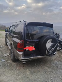 باجيرو مديل 2001 محرك بطه 2500ديلكو رقم جديد بأسمي هزه  جديده 07717041...