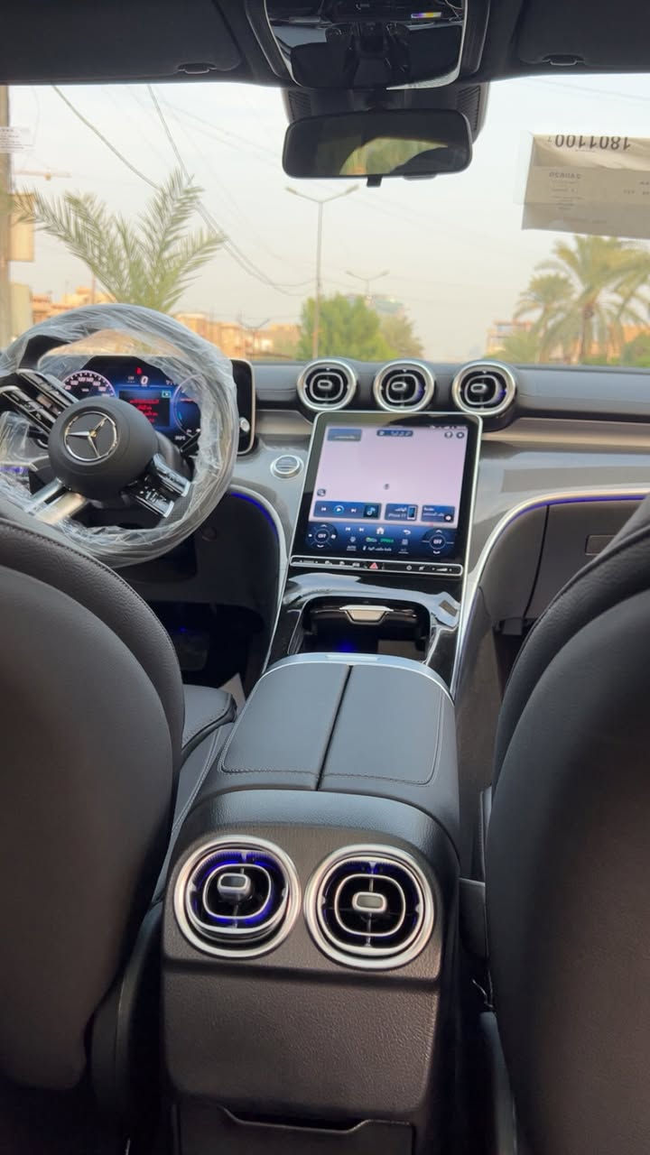 مرسيدس بنز  C350 EL 
موديل 2024
زيرووووو صفر 
رقم بغداد مميز
طراز هجين (Plug-in Hybrid) يجمع بين الأداء الرياضي والتكنولوجيا المتقدمة
ثلاث انظمة قيادة 
1️⃣ - بانزين 
2️⃣ - هايبرد 
3️⃣ - شحن كهربائي تمشيك 100 كيلو 
تختار النظام الي يعجبك 
السيارة فول الفول موصفات 

1- نظام القيادة الذاتية والمساعدة (ADAS) الرادار والكاميرات
2-  (DRIVE PILOT ) : يعتبر من أكثر أنظمة القيادة الذاتية من المستوى 3/4 تطوراً في العالم. في ظروف معينة (طرق سريعة مزدحمة)، يمكن للسائق تسليم القيادة الكاملة للسيارة وتشغيل قوانين أو مشاهدة فيلم.

3- نظام المساعدة على التوجيه الذكي (Active Steering Assist):** يحافظ على مسار السيارة في منتصف المسار، حتى في المنحنيات اللطيفة.

4- مساعد الحفاظ على المسار (Active Lane Keeping Assist): يكشف علامات المسارات ويتدخل بتوجيه عكسي لطيف إذا بدأت السيارة في الخروج عن المسار دون استخدام الإشارة.

5- مكابح الطوارئ الذكية مع (Active Emergency Stop Assist): تكشف المشاة والدراجات والسيارات، وإذا لم يستجب السائق، توقف السيارة تلقائيًا.

6- مساعد التكيف مع السرعة (Active Distance Assist DISTRONIC): تحكم تكيفي في السرعة يحافظ على مسافة آمنة عن السيارة التي أمامك، حتى في الزحام، ويتوقف ويعيد التحرك تلقائيًا.

7- مساعد تغيير المسار (Active Lane Change Assist): بمجرد تشغيل إشارة الاتجاه، تتأكد السيارة من أن المسار خالٍ وتنفذ تغيير المسار بسلاسة.

8- نظام التحذير من الاصطدام الأمامي (Front Collision Warning)

9- مساعد الخروج من المرآب الذكي (Remote Parking Assist): يمكن للسيارة أن تدخل أو تخرج من مكان ضيق (مرآب أو موقف) عن بُعد باستخدام تطبيق الهاتف الذكي، بدون وجود السائق داخلها.

10- رادار بعيد المدى (Long-Range Radar): للمسافات الطويلة على الطرق السريعة.

11- رادارات قصيرة المدى (Short-Range Radars): في الزوايا الأربع للسيارة للكشف عن العوائق أثناء المناورة وتغيير المسار.

12- أجهزة استشعار أولتراسونيك (Ultrasonic Sensors): للمسافات القصيرة جدًا أثناء الركن.

13- الشاشة ( MBUX Hyperscreen ): لوحة قيادة رقمية كاملة بشاشة كبيرة الحجم وشاشة مركزية ضخمة 

14- نظام MBUX (Mercedes-Benz User Experience): نظام الوسائط المتعددة الأكثر ذكاءً، يتعرف على الكلام الطبيعي ("مرحبا مرسيدس، أشعر بالبرودة" أو "اضبط الإضاءة على اللون الأزرق").

15- مقاعد أمامية ذات تحكم كهربائي ذاكرة  وتهوية وتسخين 

16- التحكم بالمناخ الذكي من 4 مناطق (4-Zone THERMATIC): حيث يمكن لكل راكب ضبط درجة الحرارة والتدفئة والتهوية حسب رغبته.

17- الإضاءة البيئية AMBIENT LIGHTING:مع 64 لونًا لتختار منهم، وإعدادات إضاءة متحركة ومتعددة.

18- سقف بانورامي كهربائي (Panoramic Sliding Sunroof)

19- فتح وإغلاق وإقلاع السيارة بدون مفتاح (Keyless-Go) 

20- شحن لاسلكي للهواتف الذكية 

21- نظام المساعدة على الكبح (BAS)

22- نظام منع انغلاق المكابح (ABS)

23- نظام صوتي عالي الجودة من Burmester مع 15 مكبر صوت.
 
24- دعم كامل لتكامل الهواتف الذكية عبر Apple CarPlay وAndroid Auto

اقتصادية و صديقة للبيئة : بسبب محركها الهجين الذي يمنحها مدى كهربائي طويل.
قوية ورياضية : بأداء هجين يوفر عزم دوران فوري وقوي

للاستفسار : 

***********
بغداد

