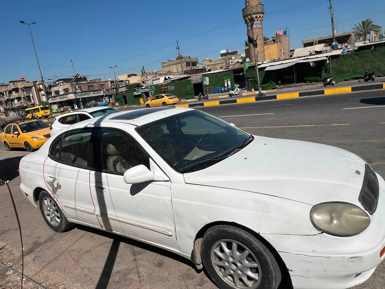 سلام عليكم دايو اكنزه مديل 2000سياره كير محرك لوك سنتر لوك وارد امريكي سياره تبريد ثلج وي سويج كهربياته كله كامله تحويل ثاني يوم سعر٣٨بيه مجال مكاني بلديات***********
