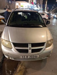 دوج كرفان بتره كشنات منفصله سياحي  سبعه راكب موديل 2006 البيع او مراوس...