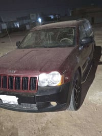 جيب شروكي ٢٠٠٩ مكينه كير مكفولات تبريد شغال  السعر 95وبيه مجال 0780224...