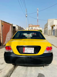 ‎لانسەر ٢٠١٠ مەکینە ١٥ گێڕو مەکینەی بە شەرت07729619537 41$‎ Singapore