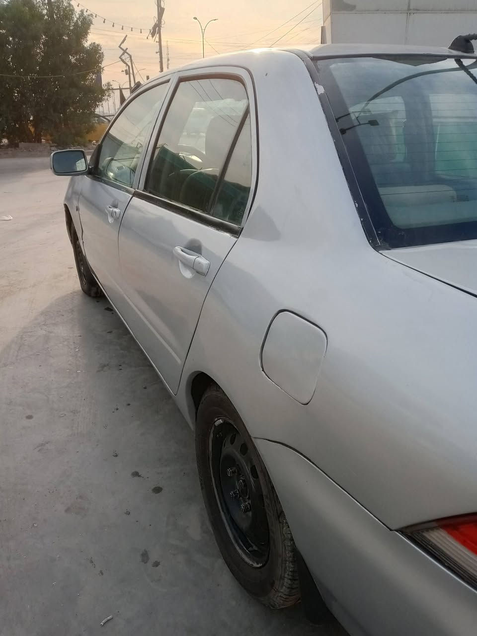 لانسر موديل 2005 مصبوغه عام اثر جراد مدوشمه كير اوتوماتيك مكينه شاشه كامرا مري تحكم رقم بصره مشروع وطني انكليزي سنويه هزه جديده سياره نضيفه مكينه 1500 مكان سياره المشتل أو العبيدي السعر 54 وبيه مجال 
 رقم هاتف ***********
