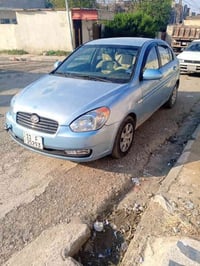 اكسنت للبيع 2008 كوري رقم بغداد إنكليزي محرك 16  جامات كهرب شاشه دوشمه...