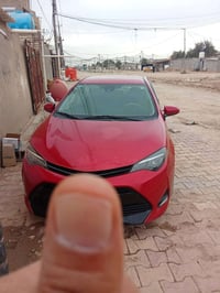 عندي كورلا موديل 18رقم بغداد باسمي للبيع السعر 130وبيها مجال الاتصال ع...