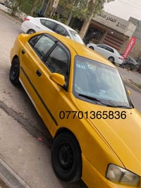 اكسنت • ٢٠٠٠ • توماتيك