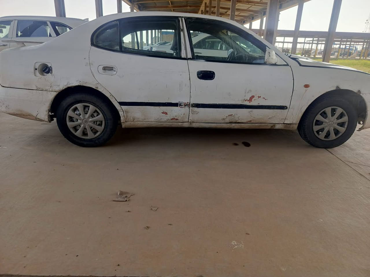 دايو لكنزه موديل 1999كيرعادي محرك وكير قبل شهر شادلهه سنويه صاقطه سنة 2019 اتكفلك بل تحويل السعر 15 ورقه المكان صلاح الدين بلد رقم الهاتف (***********)
