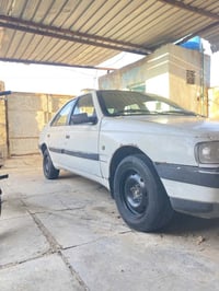 بيجو 405 موديل 2009  مكينة وگير نضيفات غراض كلة اصلي وجديد  ماتطفة بيك...