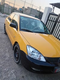 لانسر ٢٠٠٨ • مكينة ٢٠٠٠ • اوتو