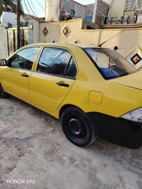 لانسر • ٢٠١٠ • مكينة ٢٠٠٠