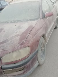 اوبل بزون • مكينة ٢ونص • رقم بغداد