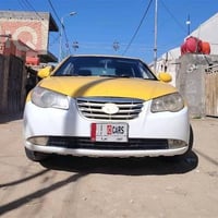 إلنترا ٢٠٠٩ • اوتوماتيك • أصفر