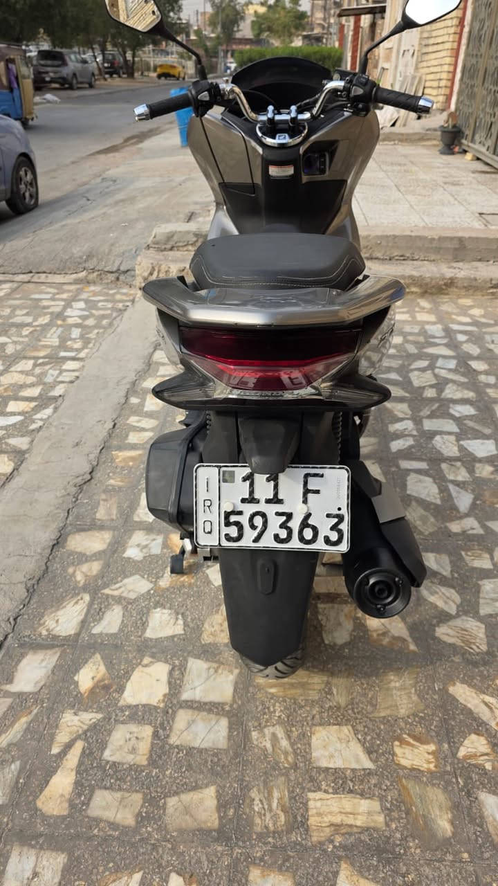 ‏السلام عليكم PCX جيل ثالث 🇯🇵 ياباني مرقم بغداد مشروع وطني تحويل ثاني يوم رقم انكليزي 
‏وياه بصمة وحدة  
‏​⚙️ المحرك: 125CC 
‏​🎨 اللون: فيل  مـمـيـز ❄️.  
‏ماشية 21 الف وبل يابان ماشية9 تالاف 
‏مواصفات
‏حساس ازدحام ✅
‏حساس استان ✅
‏الدراجة ورقة المزاد مالتهة وصور اليابان وتقريرهة  مالتهة موجود    
‏ 🛠️ الدراجة: مكفولة كفالة عامة من كلشي 
‏​​📍 الـمـكـان: بـغـداد 🇮🇶
‏📱 لـلـتـواصـل والإسـتـفـسـار:📞 [ *********** ]
‏
