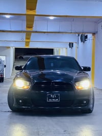 دۆج (ساخ)  مۆدێل ٢٠١٤ پۆلیسی مەکینە هیمی ٨ بستۆن  سەیارەکە بێعەیبوعارە...