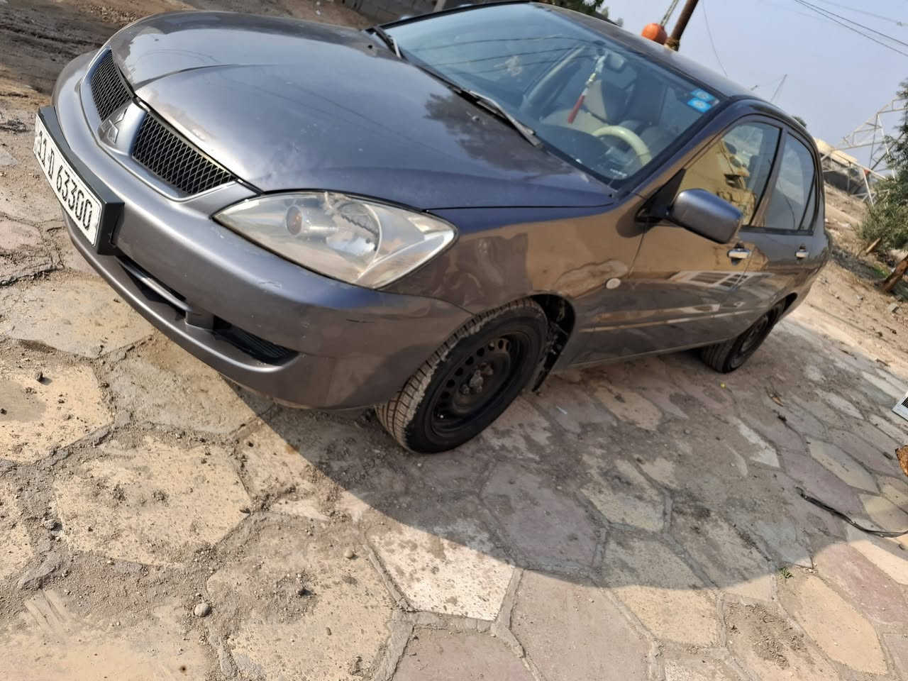 السلام عليكم لانسر موديل 11بغداد بسمي محرك ٢٠٠٠ محرك وكير وتخم تاير وتبريد وتدفئه وحداديه وسنويه كلهن جدد بيه صبغ جاملغ خلفي وتبديل باب خلفي نفس اللون السياره ماعايزه ربع مكاني حله 
***********
السعر ٧٨
