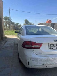 اوبتيما لوتز 2010 لون ابيض صدفي سيارة مكفولة من الفتح بيها صبغ ومعجون ...