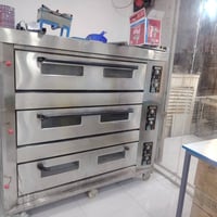 فرن كهربائي • جاهز للاستعمال • مع اغراض