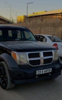 دوج نيترو رقم بغداد انكليزي باسمي لون اسود ضرر جاملغ خلفي ايسر+بنيد طا...