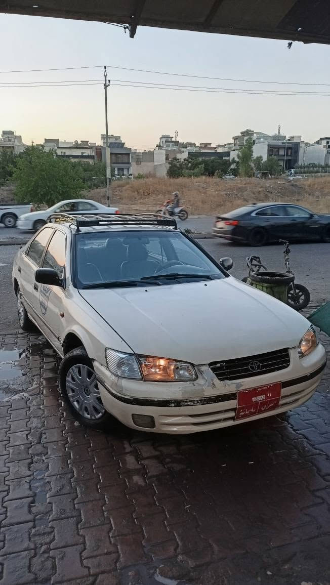 Toyota Camry taxi 🚕 
***********
تۆیۆتا کامری ٢٠٠٢ مەکینە چوار پستۆن کراوە بە غازی قەیوان گێڕ ئۆتۆماتیک تەنها چەمەلەغی سەکنی دەعمە ماڵی دۆستە بێ مەسرف تەبریدی لەسەر سویچ گەرمیو هەموو گیانی ئیش ئەکات مەرجی توندوتۆڵی تازە کراوەتەوە سەیارەکە پاک ماوەتەوە گێڕو مەکینە بەشەرت 
نرخی ٦٥گەڵا و معامەلەیە برایانە 
*********** شربازهير, السليمانية
