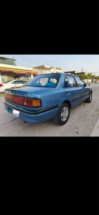 مازدة 323 بها كوبون رةقم جديد شرت تحول مكان  التوان كوربري 07509701157...