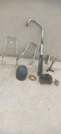 غراض ماطور كزوز كاتم وكابريتة وخوذة وتانكي مال بزون وسيباية وويل خلفي ...