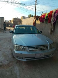 سياره اوبتيما للبيع  رقم الهاتف 07831110856