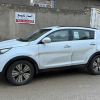 كيا سبورتج 2105 مكفوله باسمي سياره جاهزه 07814406333