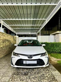 كورلا هايبرد  ( 2025 )  شكل الخليجي  رقم بغداد  مكفولة صبغ والتبديل وا...