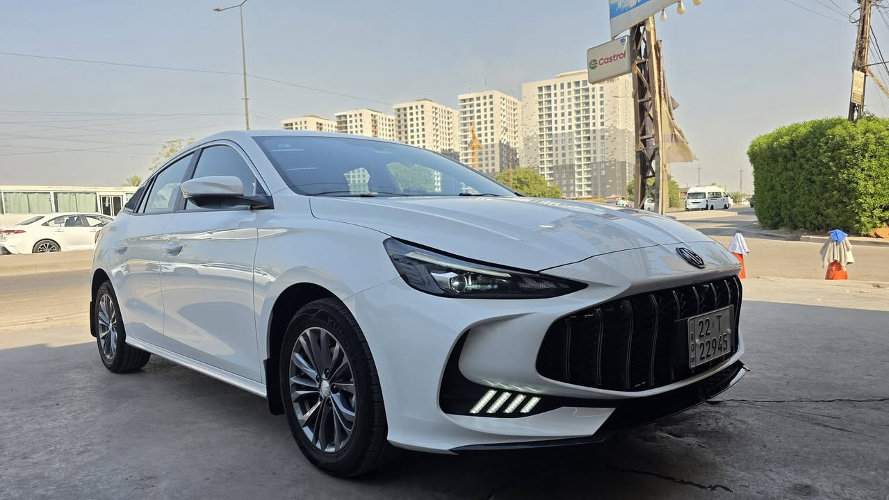 📣 للبيع: MG5 GT موديل 2025 بحالة الزيرو جديده كلش وبيها اضافات كماليات تقريبآ بال 600 الف
​الموديل: 2025
​المسافة المقطوعة: 13,000 كيلومتر فقط
​المحرك: 1500 DVVT اقتصادي وقوي جداً
​🛡️ السيارة مكفولة كفالة عامة من كل شيء (حادث، صبغ، بارد) 
​🚗 بحالة البلاد ممتازة ونظيفة جداً (داخلية وخارجية) ولا تحتاج لأي مصاريف.
​أبرز المواصفات والميزات:
​☀️ فتحة سقف سلايد . تبريد خلفي
​💺 داخلية جلد أسود مميزة ومطرزة بخيوط حمراء رياضية بحالة الوكالة (أكياس الشركة لا تزال على بعض القطع).
​🎥 شاشة عرض كبيرة تدعم أنظمة الترفيه
 كاميرا 360 درجة (رؤية محيطية كاملة).
​🖥️ شاشة عدادات رقمية (ديجيتال) حديثة.
​🔘 نظام التشغيل الذكي (بصمة تشغيل وبصمة أبواب).
​🅿️ مكبح يد إلكتروني (Handbrake دكمة) مع نظام Auto Hold.
​🎡 مقود مطرز متعدد الوظائف (تحكم ستيرن كامل).
​💡 إضاءة أمامية وخلفية LED حديثة مع حساسات خلفية للمساعدة على الركن.
​🛞 ويلاد كروم رياضية مميزة ونظيفة جداً.
​📌 مكان السياره بغداد السيدية
​الرقم: [ اربيل هزة وفحص جديد] السنويه بأسمي
​السعر المطلـوب: [ 125 ورقه ]
 (للجادين فقط) التواصل والاستفسار : [*********** / ***********]
