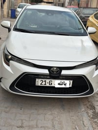 كورلا 20 LE رقم سليمانيه  لون ابيض صدفي صور مع السونار موجوده سونار جد...