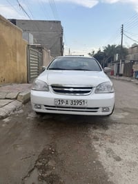 اوبترا موديل 2010 باسمي  سياره جديده مكفوله من كلشي فقط بيه شخطين بالج...