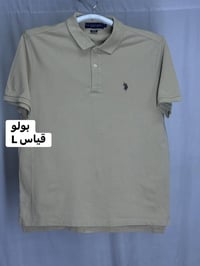 تشيرت  (بولو )ً سوبر كريم   قياس  L  النظافه 💯/💯    يوجد توصيل 🚚 (بغدا...