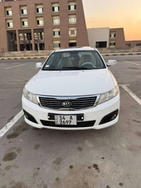 اوبتيما ٢٠١٠ • فول مواصفات • فتحة بصمة