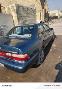 كورولا موديل 94 يسرى بلاد رقم بغداد جاهزه متصرف عليها الف كير محرك مكف...