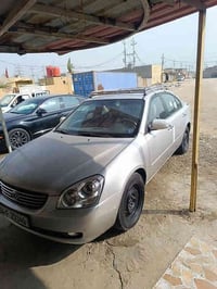 كيا اوبتيما موديل 2009 مكينه كاظه 07735233430