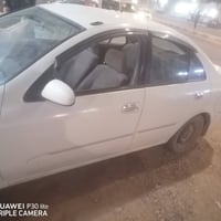 وبركاته سياره للبيع نيسان صني موديل ٢٠٠٣رقم نينوئ القديم شرط وكاله فقط...