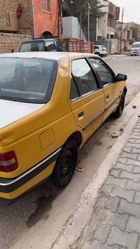 بيجو 405 مديل 12 على وضع الشركه مبدل بيه فقط باب السايق محرك وكير وصدر...