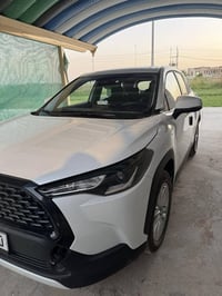 كورلا كروس هايبرد ٢٠٢٤  مكينة ٢٠٠٠  مكفولة كفالة عامة  ماشية ٣٣  بصمة،...
