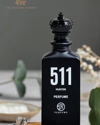 عطر ٥١١ • رجالي • خشبي دافئ