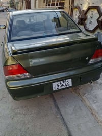 لانسر موديل 2002 سنويه 2029 هزه جديد بسمي سياره مصبوغ عام كانو تكسي وت...