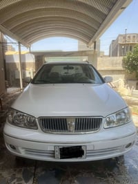 نيسان موديل 2009 بدون صبغ رقم بغداد مميز  مكان السياره الاعظميه 077100...
